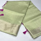 Sage Green Linen Saree with Silver Zari & Rani Pink Tassels
