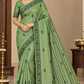 Tussar Semi Silk- Sage Green Tussar Semi Silk Saree with Traditional Black Folk Motif Border