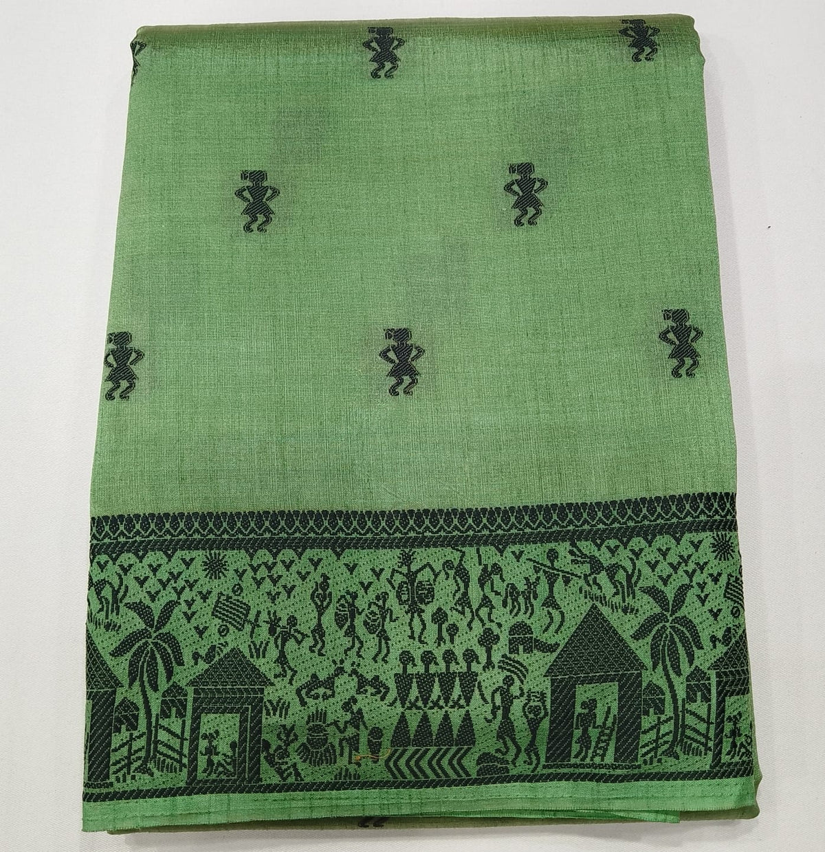 Tussar Semi Silk- Sage Green Tussar Semi Silk Saree with Traditional Black Folk Motif Border
