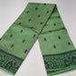 Tussar Semi Silk- Sage Green Tussar Semi Silk Saree with Traditional Black Folk Motif Border