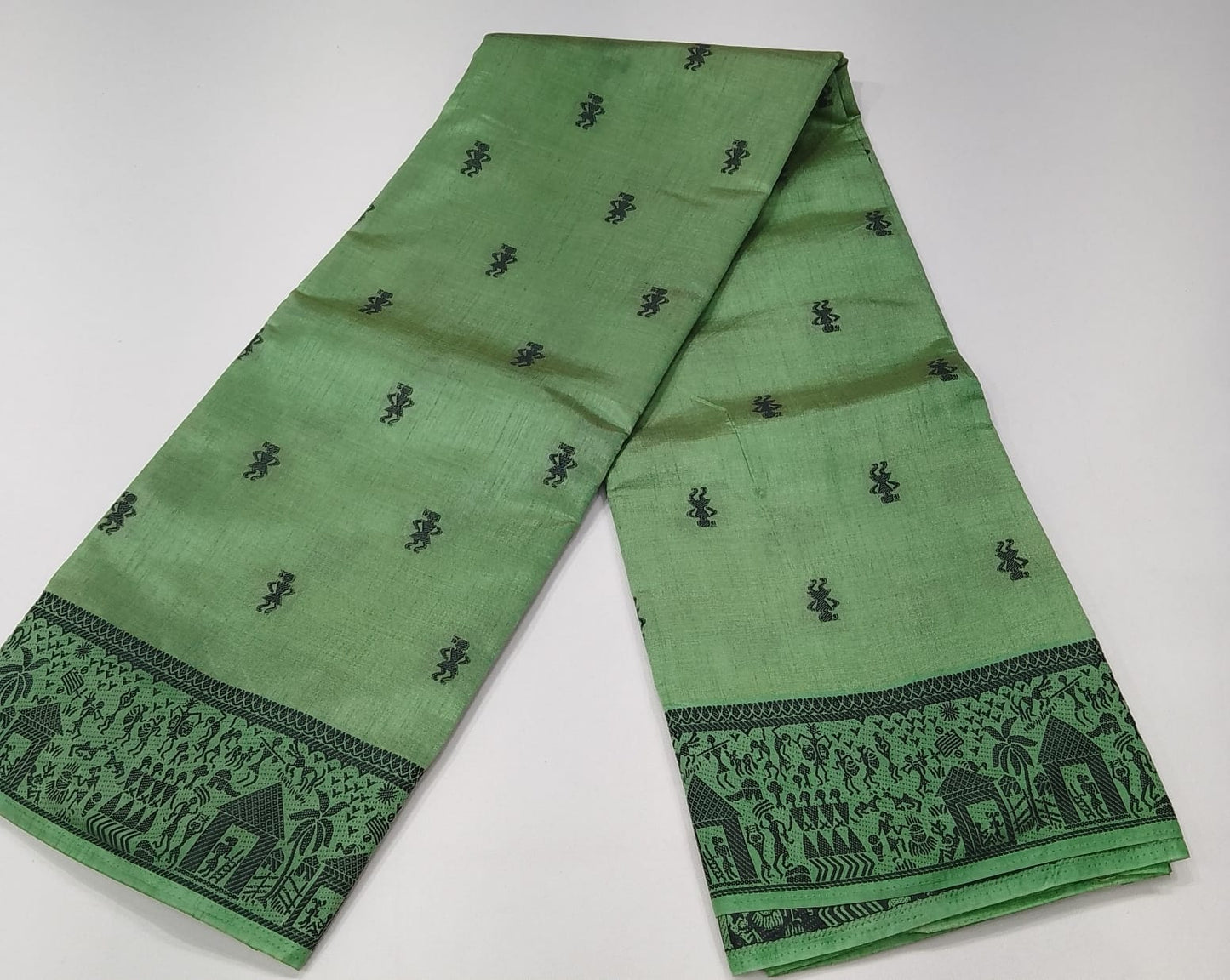 Tussar Semi Silk- Sage Green Tussar Semi Silk Saree with Traditional Black Folk Motif Border