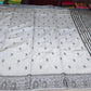 Tussar Semi Silk - Silver Grey Tussar Semi Silk Saree with Charcoal Tribal Art Border