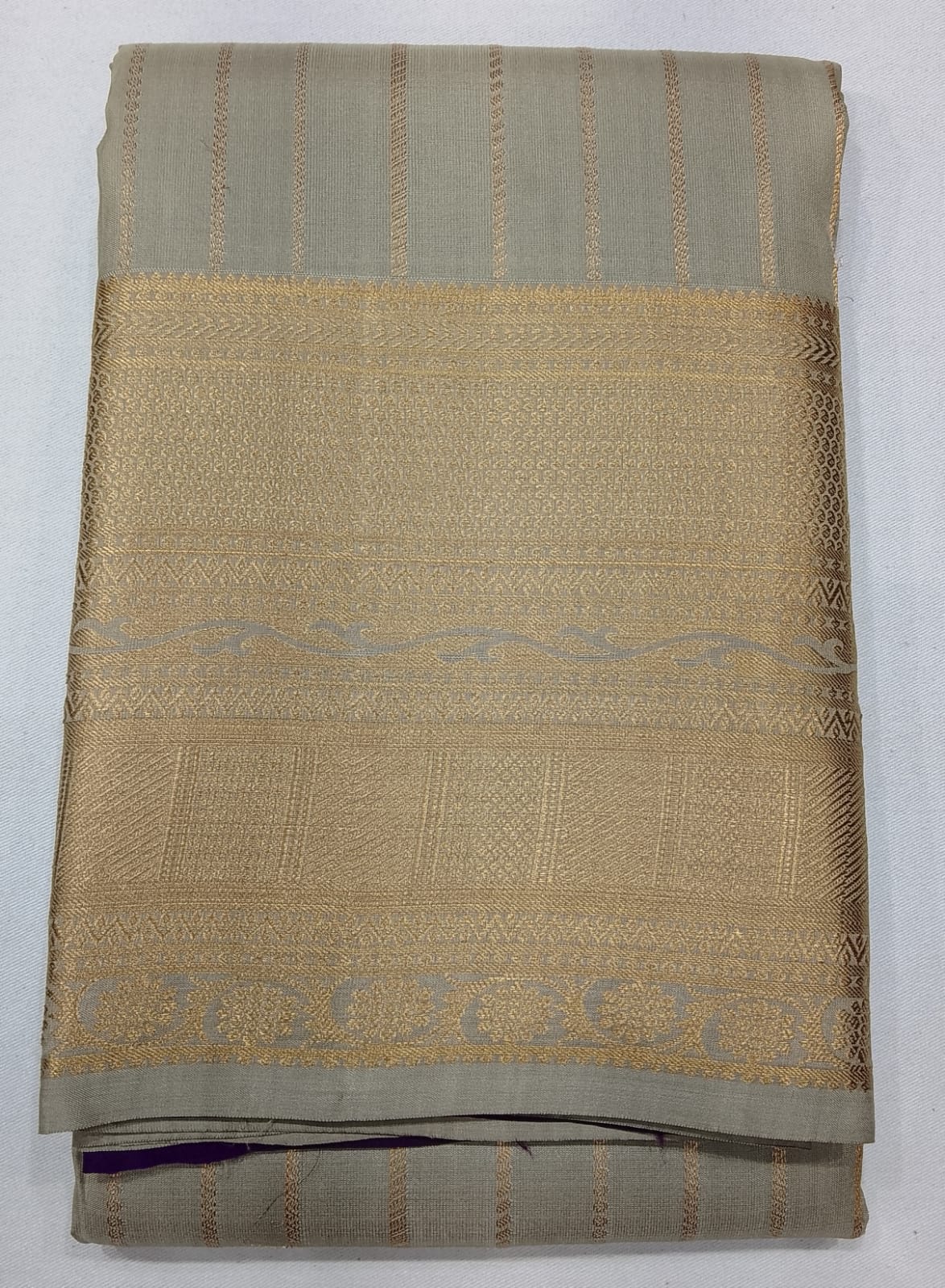 Pure Kanjivaram Handloom Silk Saree in Muted Taupe Grey with Deep Purple Pallu and Antique Gold Zari
