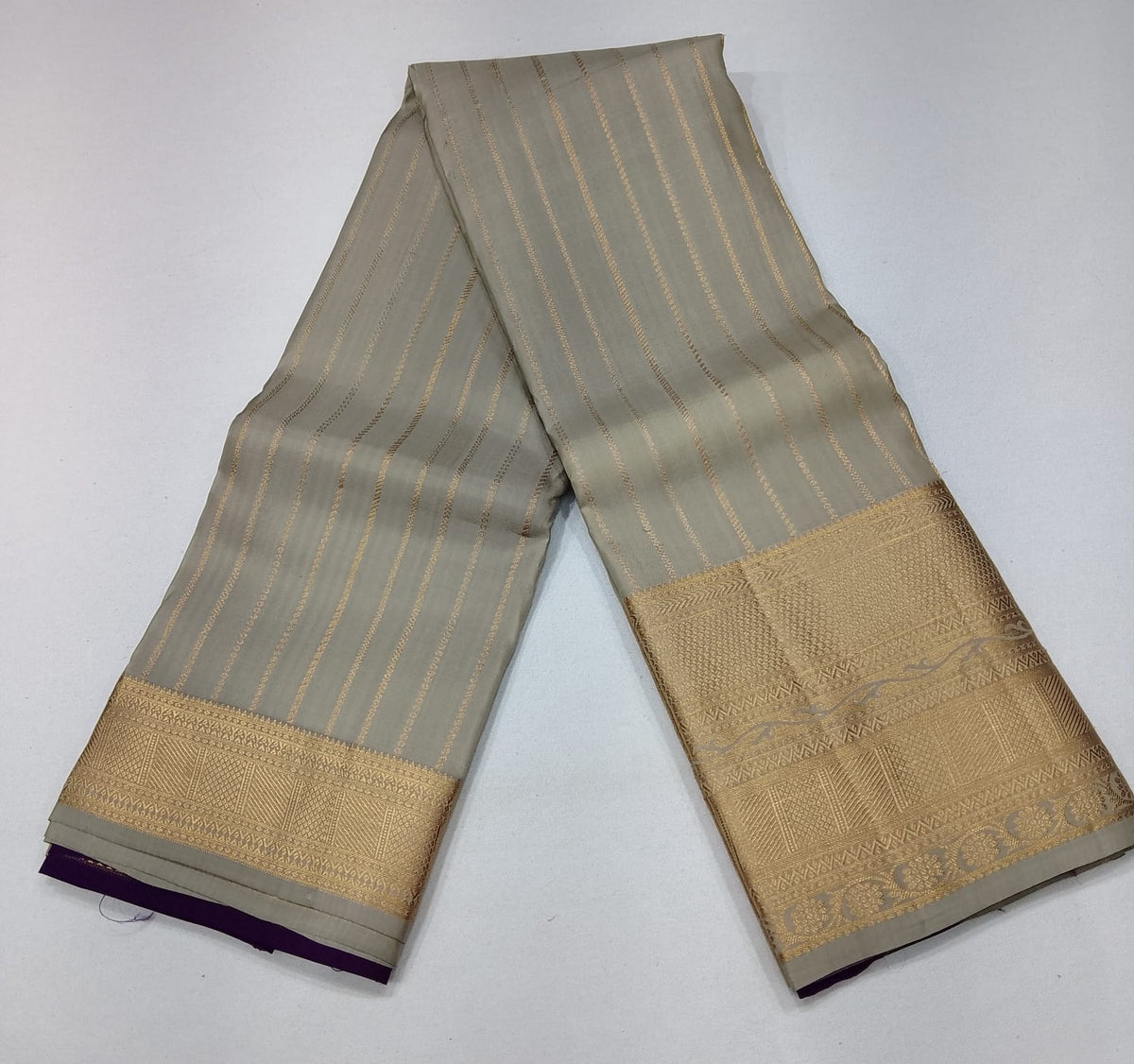 Pure Kanjivaram Handloom Silk Saree in Muted Taupe Grey with Deep Purple Pallu and Antique Gold Zari