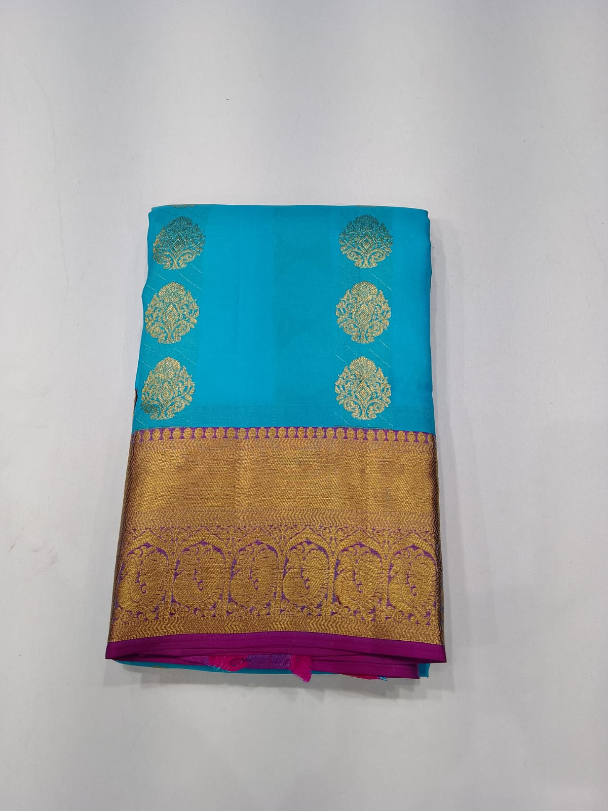 Pure Handloom Kanjivaram Silk Saree – Turquoise Blue & Magenta Purple with Antique Gold Zari