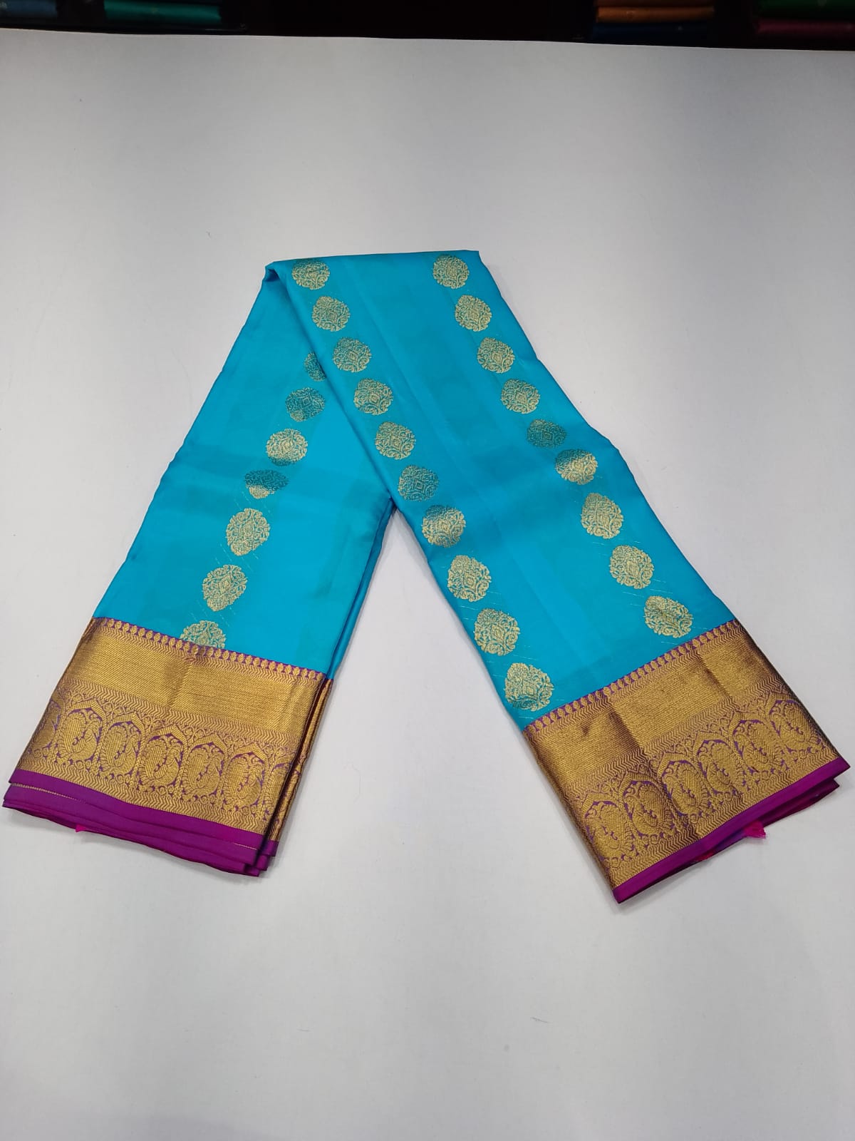 Pure Handloom Kanjivaram Silk Saree – Turquoise Blue & Magenta Purple with Antique Gold Zari