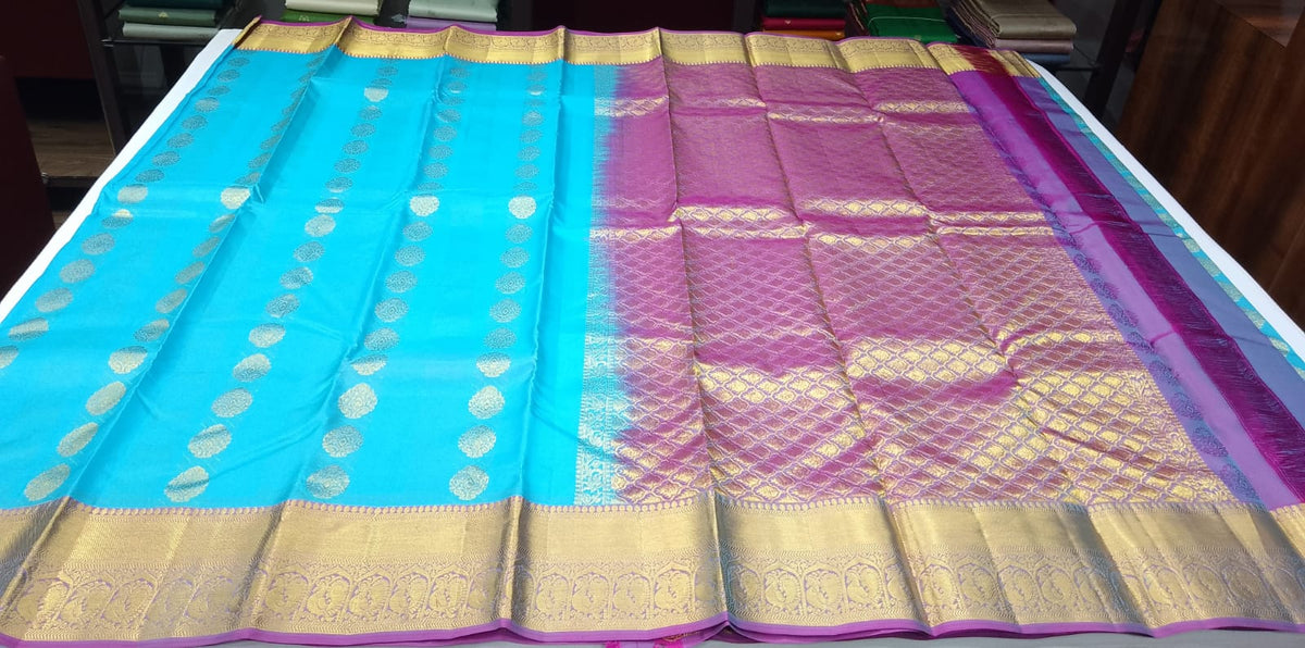 Pure Handloom Kanjivaram Silk Saree – Turquoise Blue & Magenta Purple with Antique Gold Zari