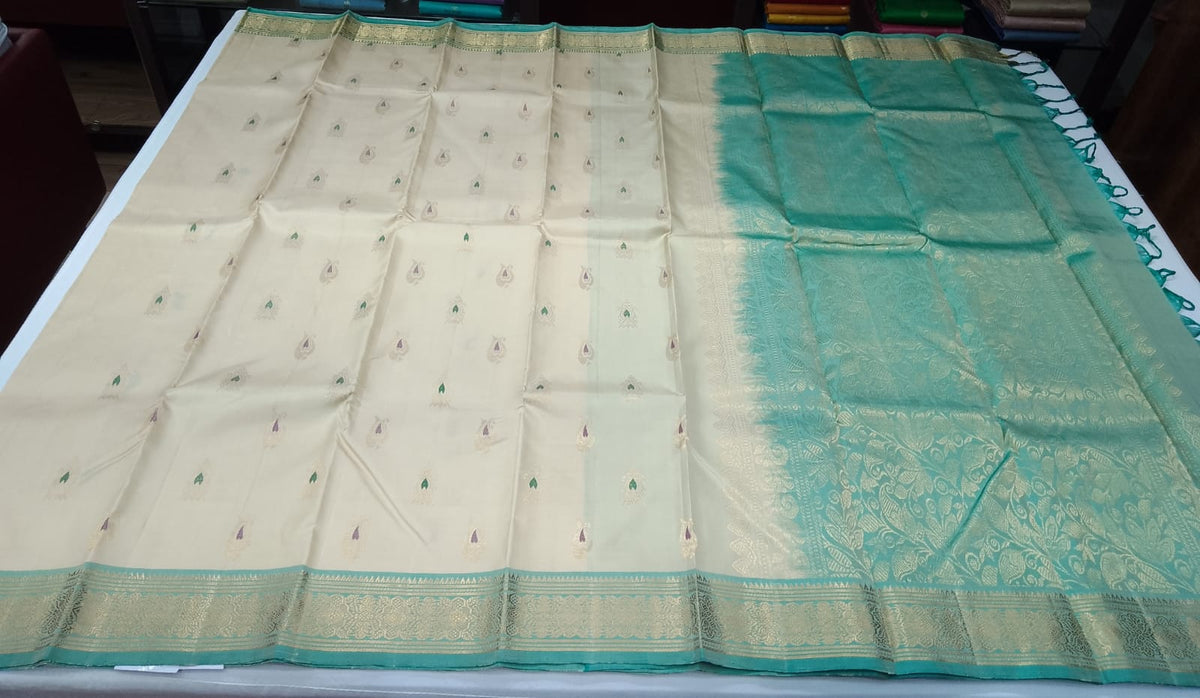 Pure Handloom Kanjivaram Silk Saree in Sandal Beige with Turquoise Teal Green Zari Border