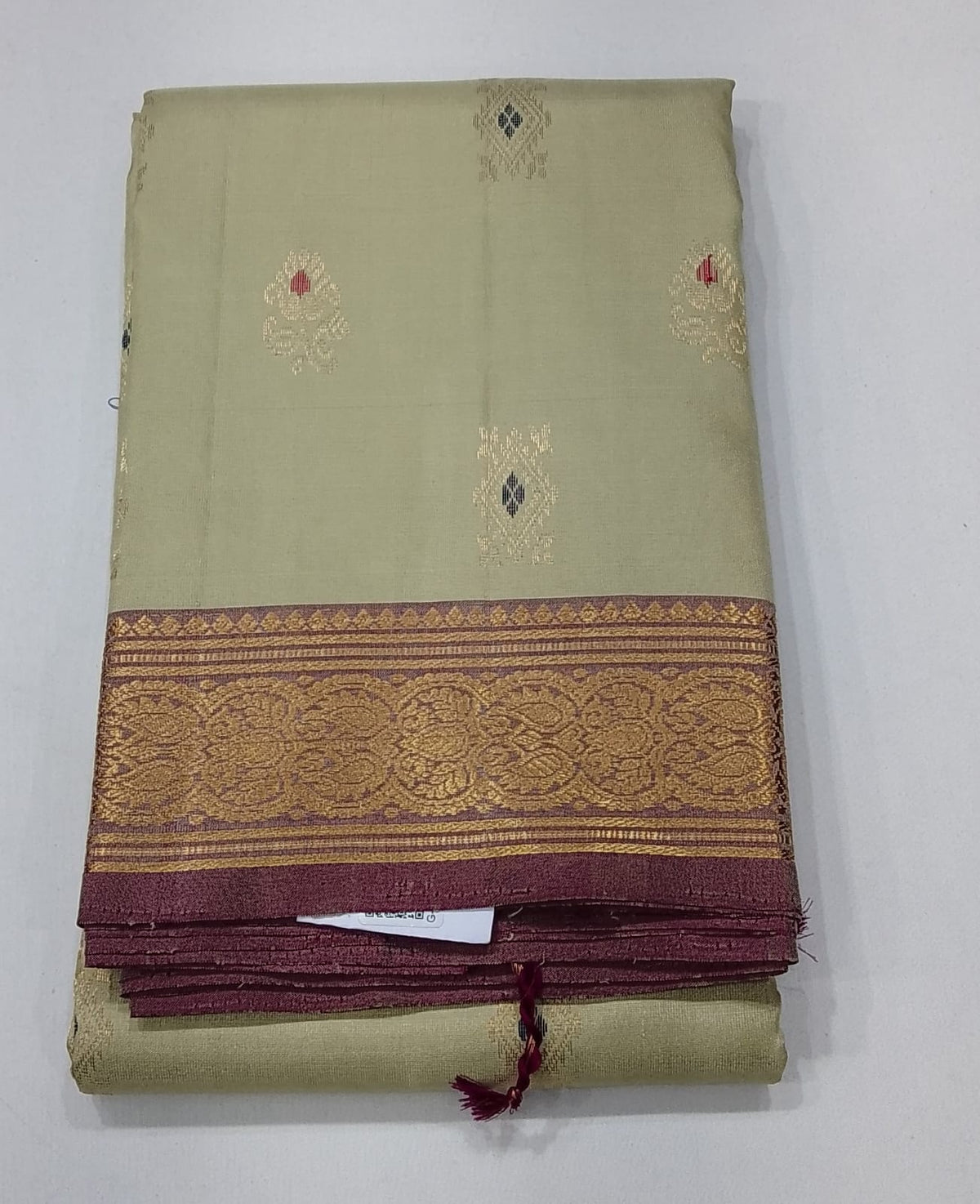Pure Handloom Kanjivaram Silk Saree in Muted Sage Green with Onion Plum Zari Border