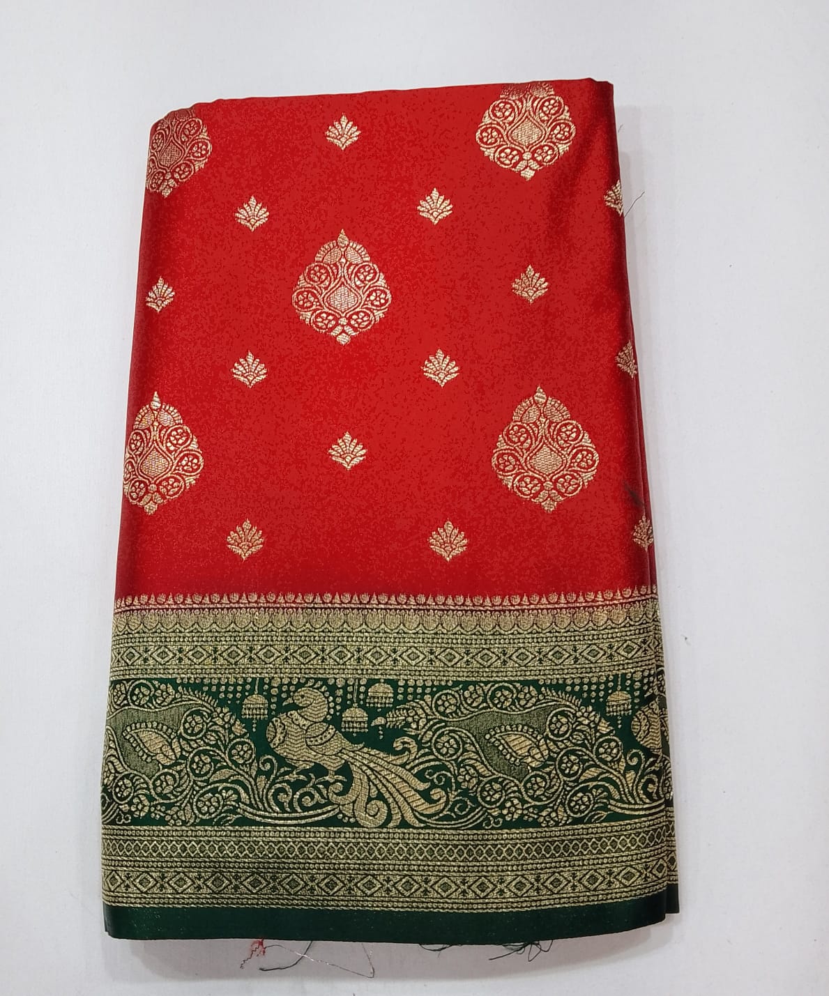 Vermilion Red & Bottle Green Semi Soft Silk Saree with Gold Zari Buttas and Peacock Brocade Pallu