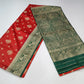 Vermilion Red & Bottle Green Semi Soft Silk Saree with Gold Zari Buttas and Peacock Brocade Pallu