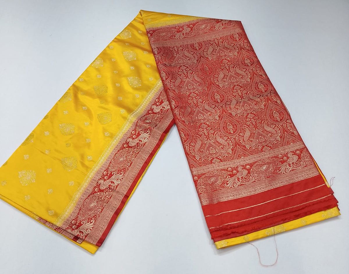 Bright Golden Yellow & Maroon Red Semi Soft Silk Saree with Gold Zari Buttas and Rich Brocade Pallu