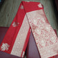 Coral Red Banarasi Soft Georgette Saree with Silver Zari Floral Buttas and Rich Brocade Pallu
