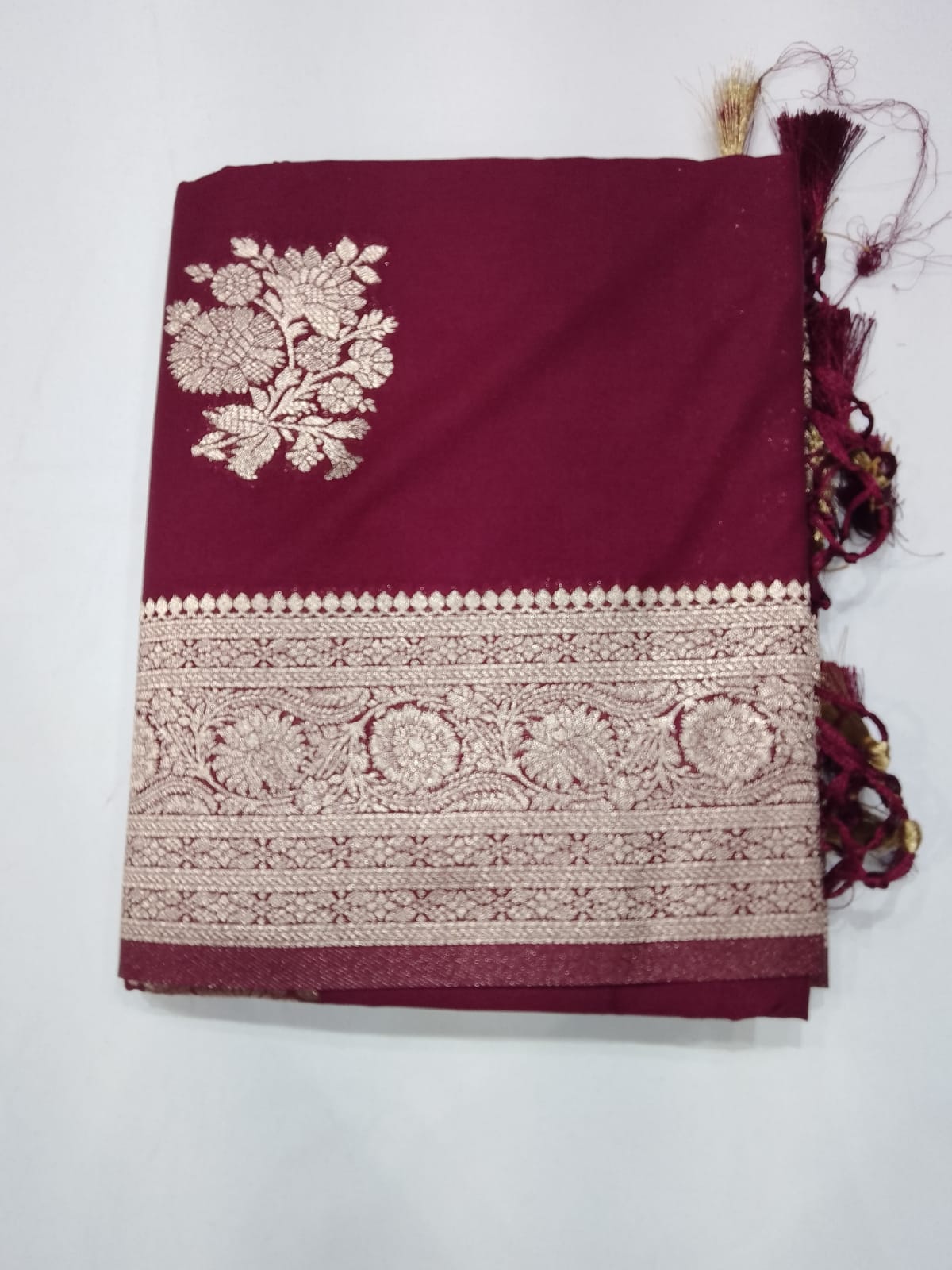 Wine Maroon Banarasi Soft Georgette Saree with Silver Zari Floral Buttas and Rich Brocade Pallu