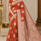 Rust Orange Banarasi Soft Georgette Saree with Silver Zari Floral Buttas and Rich Brocade Pallu
