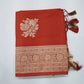Rust Orange Banarasi Soft Georgette Saree with Silver Zari Floral Buttas and Rich Brocade Pallu