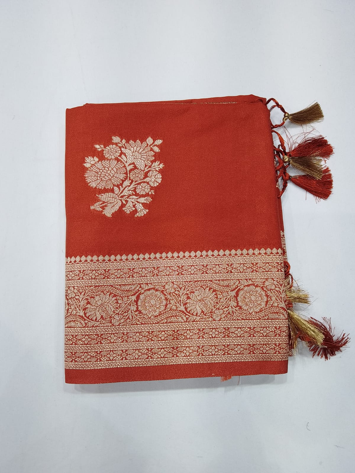 Rust Orange Banarasi Soft Georgette Saree with Silver Zari Floral Buttas and Rich Brocade Pallu