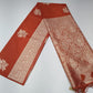 Rust Orange Banarasi Soft Georgette Saree with Silver Zari Floral Buttas and Rich Brocade Pallu
