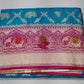 Banarasi Semi Silk -Turquoise Blue with Rani Pink Zari Border & Traditional Elephant Motifs