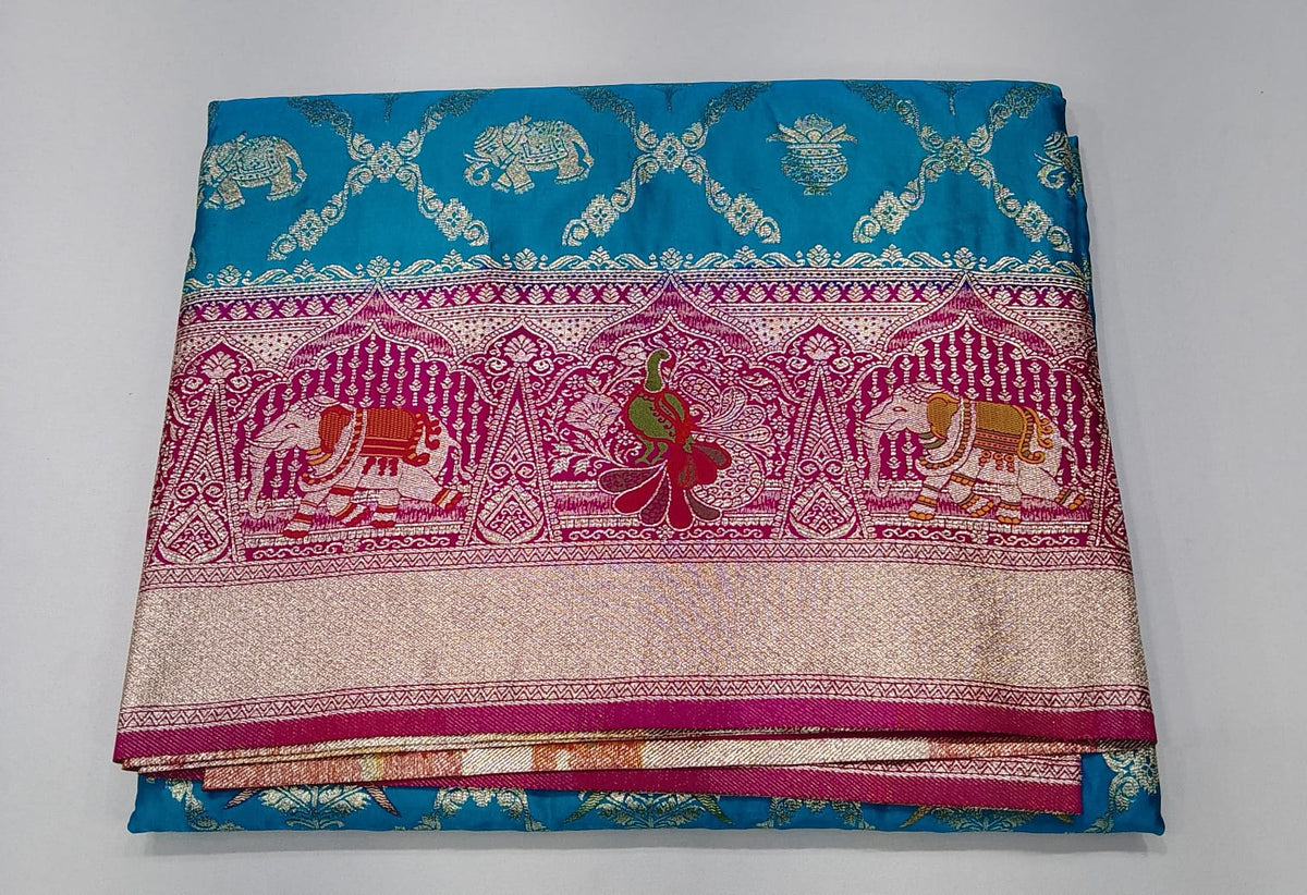 Banarasi Semi Silk -Turquoise Blue with Rani Pink Zari Border & Traditional Elephant Motifs