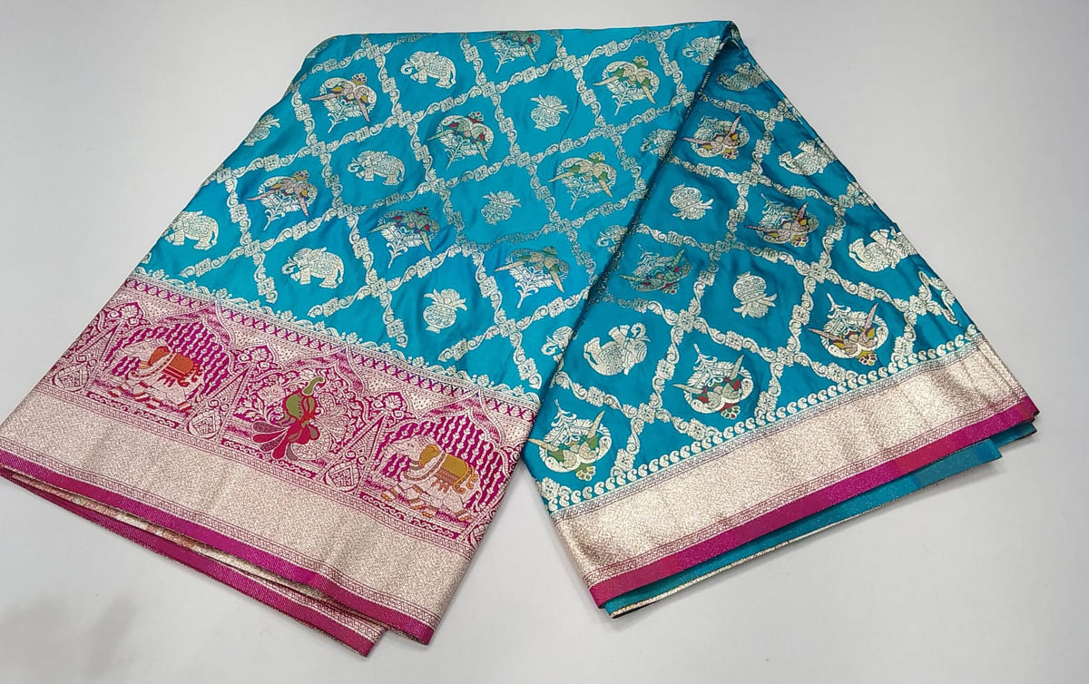 Banarasi Semi Silk -Turquoise Blue with Rani Pink Zari Border & Traditional Elephant Motifs