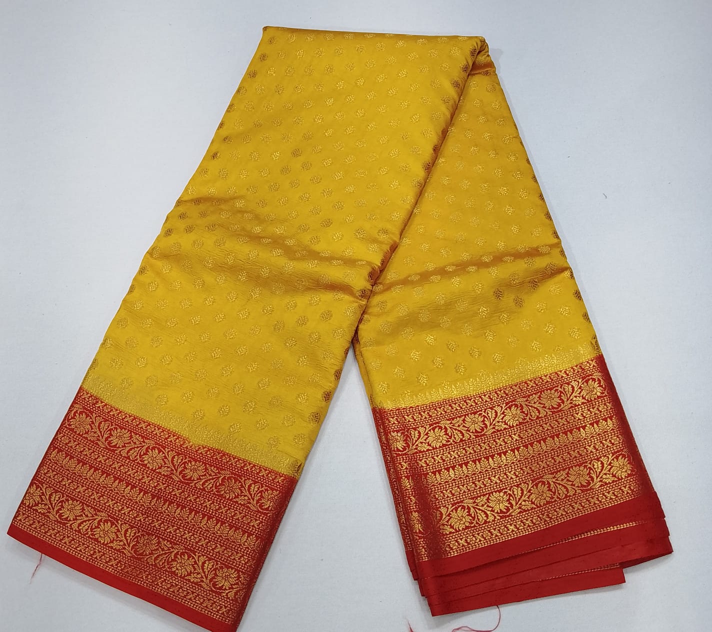Semi Silk Butta Saree – Golden Yellow with Vermilion Red Rich Zari Border & Grand Pallu